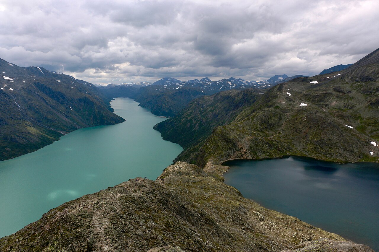 The Besseggen ridge between the emerald Lake Gjende and dark-blue Bessvatnet in Jotunheimen