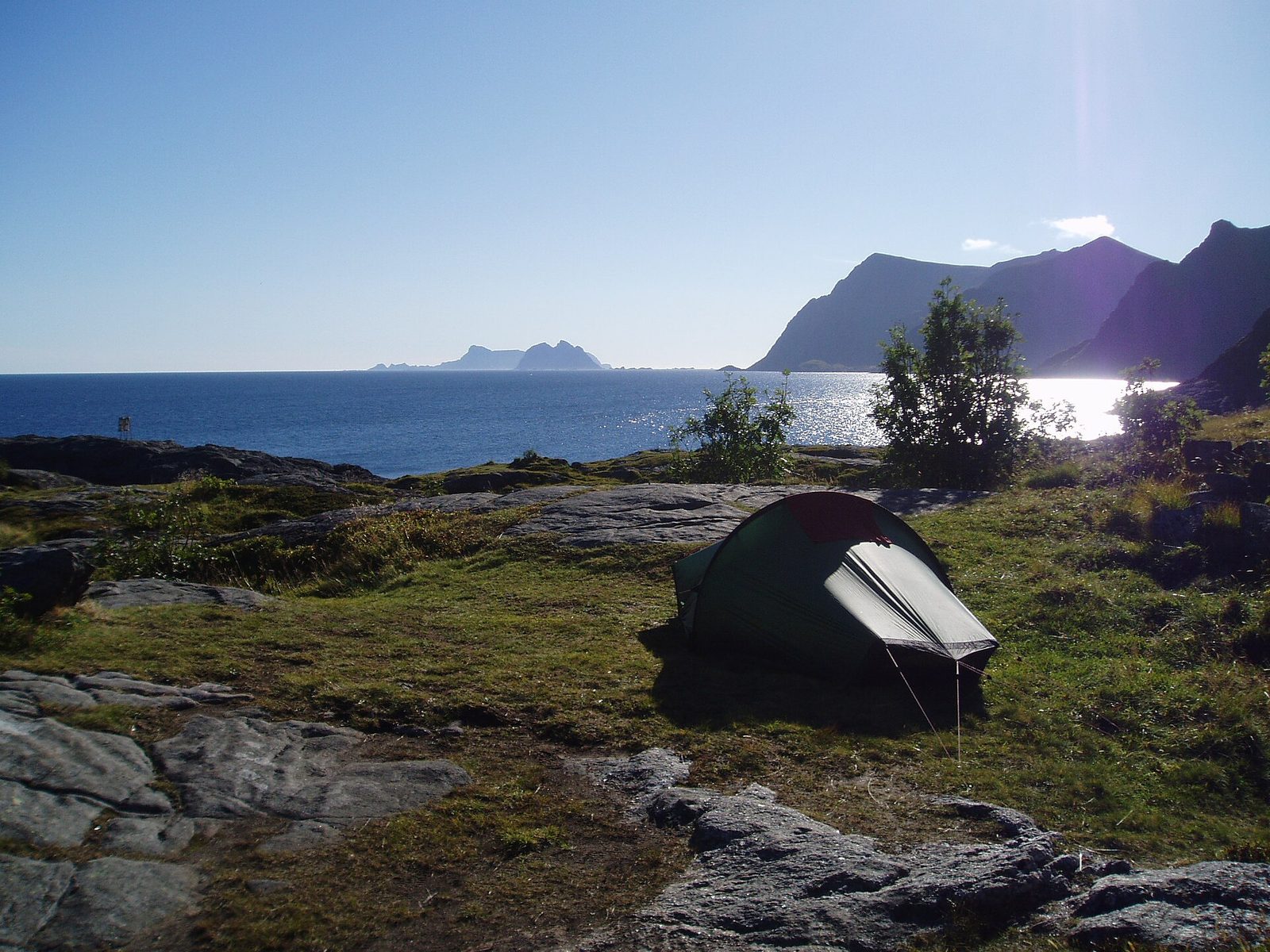 A tent pitched by the sea at A in the Lofoten Islands under Norway's right to roam (allemannsretten)