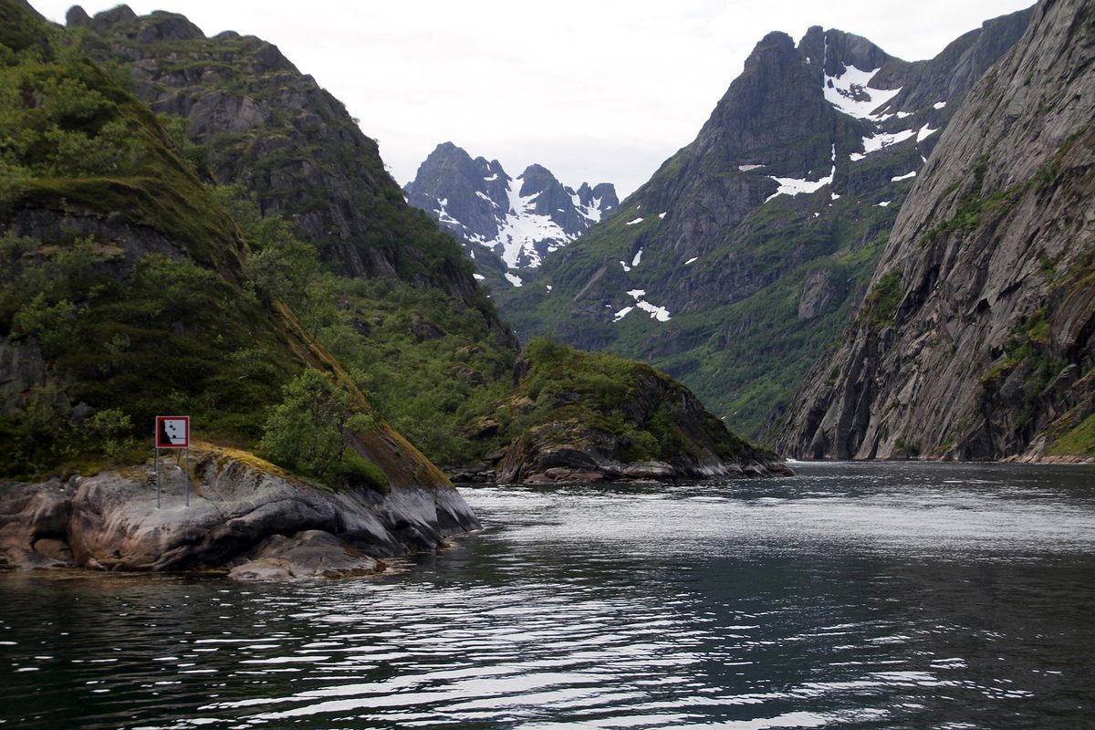 The narrow Trollfjord between steep rock walls in northern Norway
