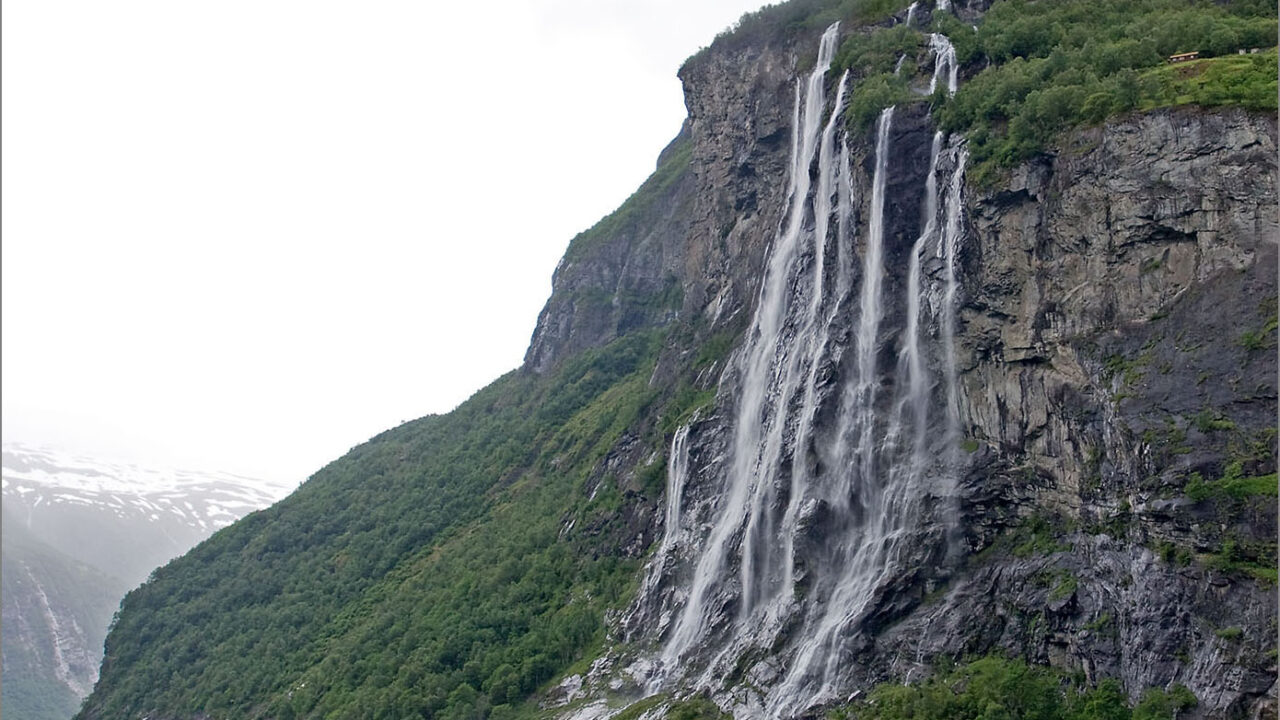 The Seven Sisters waterfall dropping into the Geirangerfjord, one of the best places to visit in Norway