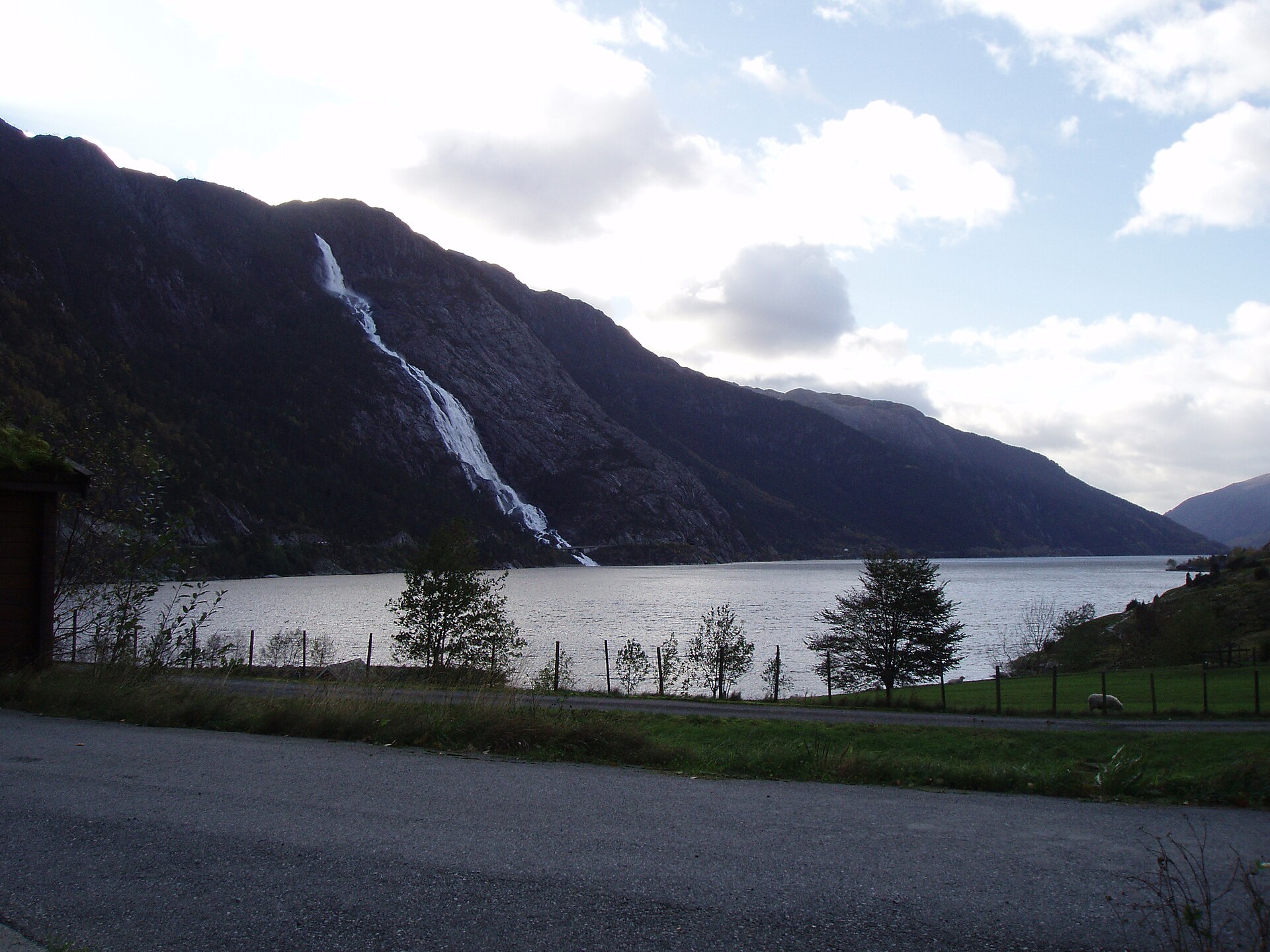 Langfossen waterfall sliding 612 metres down the mountainside into the Åkrafjord in western Norway